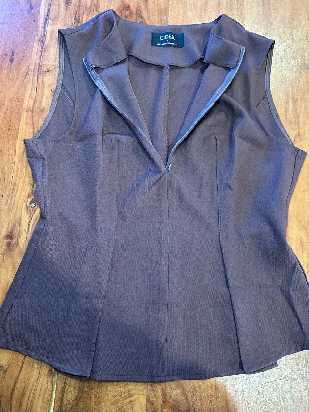 Cider Sleeveless V-Neck Peplum Top in Brown